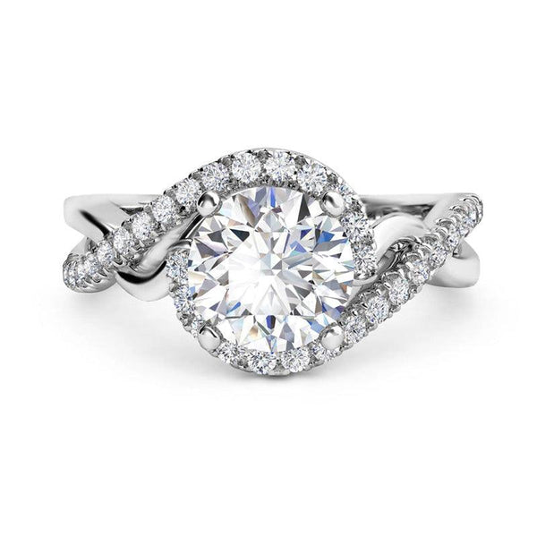 Tessa - Unique halo diamond ring. Round centre diamond. White gold