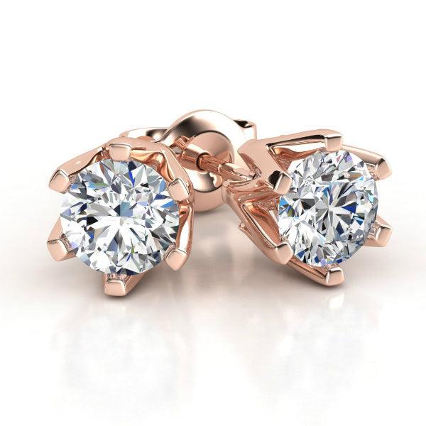 Round Diamond stud earrings in rose gold, six claw setting. Round diamonds. Total 0.20 carats — view 1