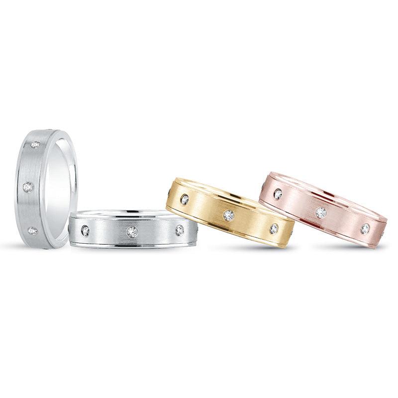 Zeus men's diamond wedding ring with gypsy set diamonds around the band.  Available in white gold, yellow gold rose gold or paltinum.