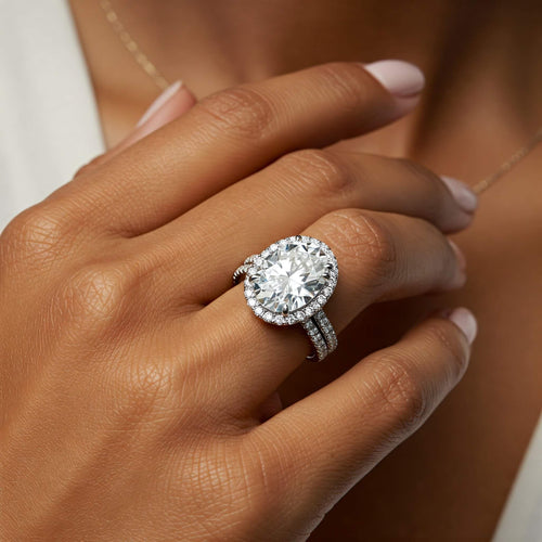 Oval diamond halo engagement ring with diamond band by Monroe Yorke Diamonds, Australia