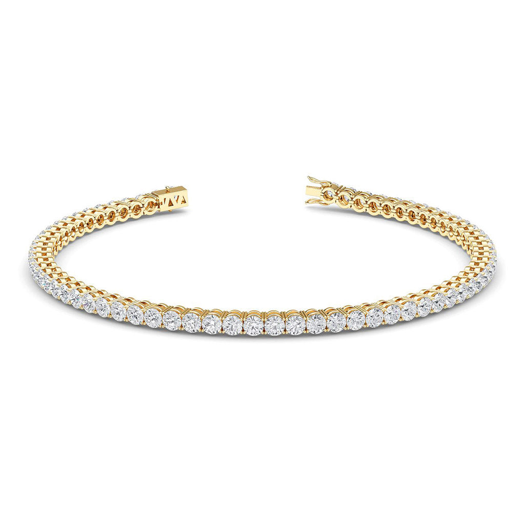 5 carat diamond tennis bracelet in gold. 