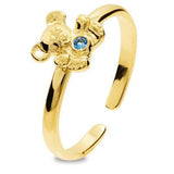 Girls first teddy bear ring with a blue gem stone in its tummy