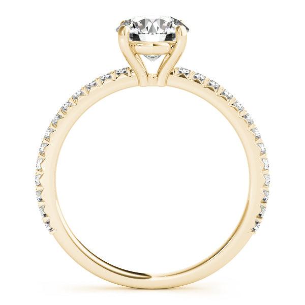April yellow gold engagement ring, side profile showing the open four claw setting