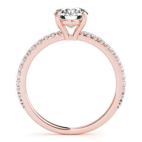 April rose gold engagement ring, side profile showing the open four claw setting