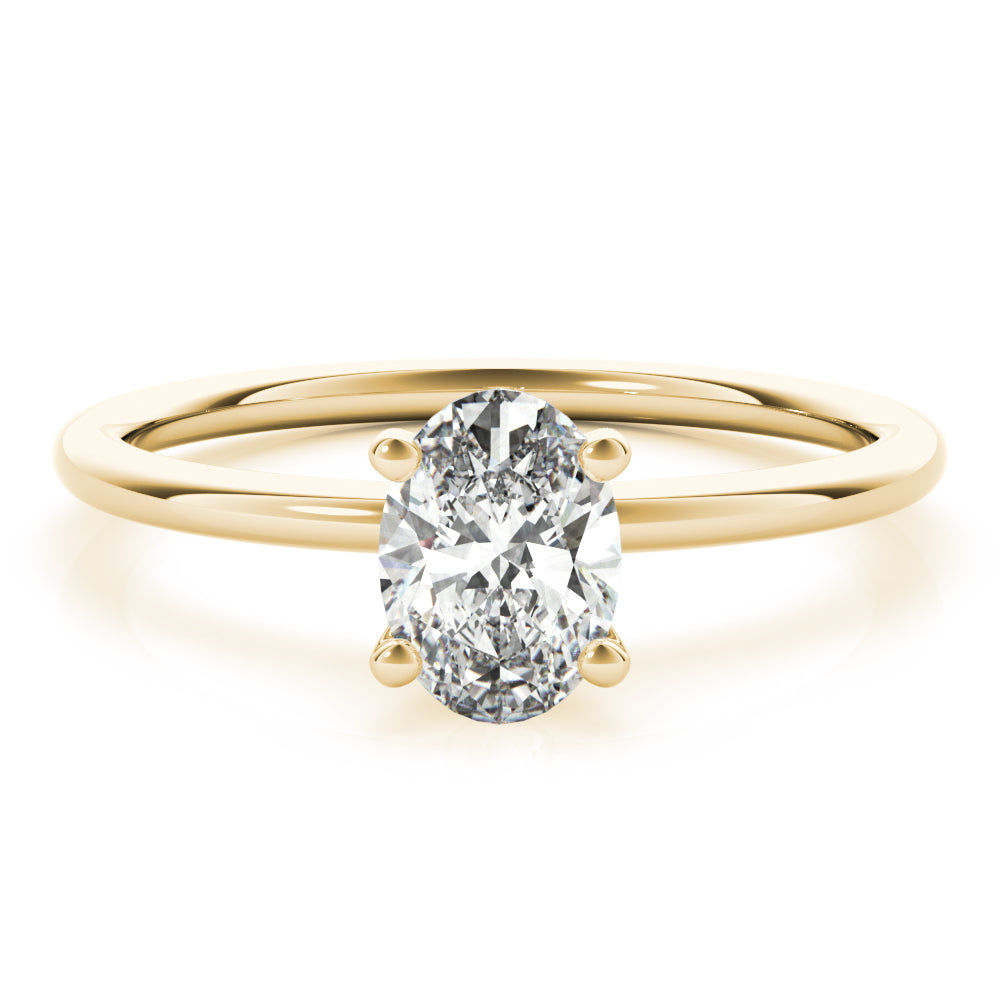Margot oval diamond solitaire engagement ring in yellow gold, top view