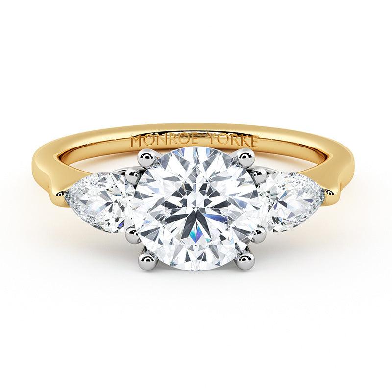 Adele round and pear diamond three stone ring in 18ct yellow gold, top view