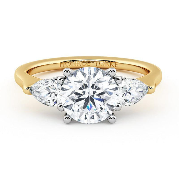 Adele round and pear diamond three stone ring in 18ct yellow gold, top view