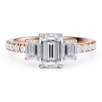 Aspen emerald cut diamond trilogy ring in 18ct rose gold, top view