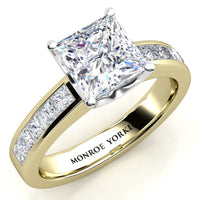 Albany gold princess cut diamond engagement ring. Yellow Gold band with channel set princess cut diamonds. Centre GIA certified princess cut diamond 