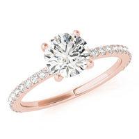 April engagement ring in rose gold, front view showing the round brilliant centre above a diamond set band