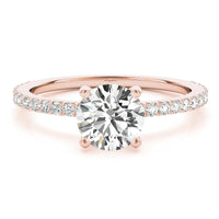 April rose gold engagement ring, angled view showing the accent diamonds running down the shoulders
