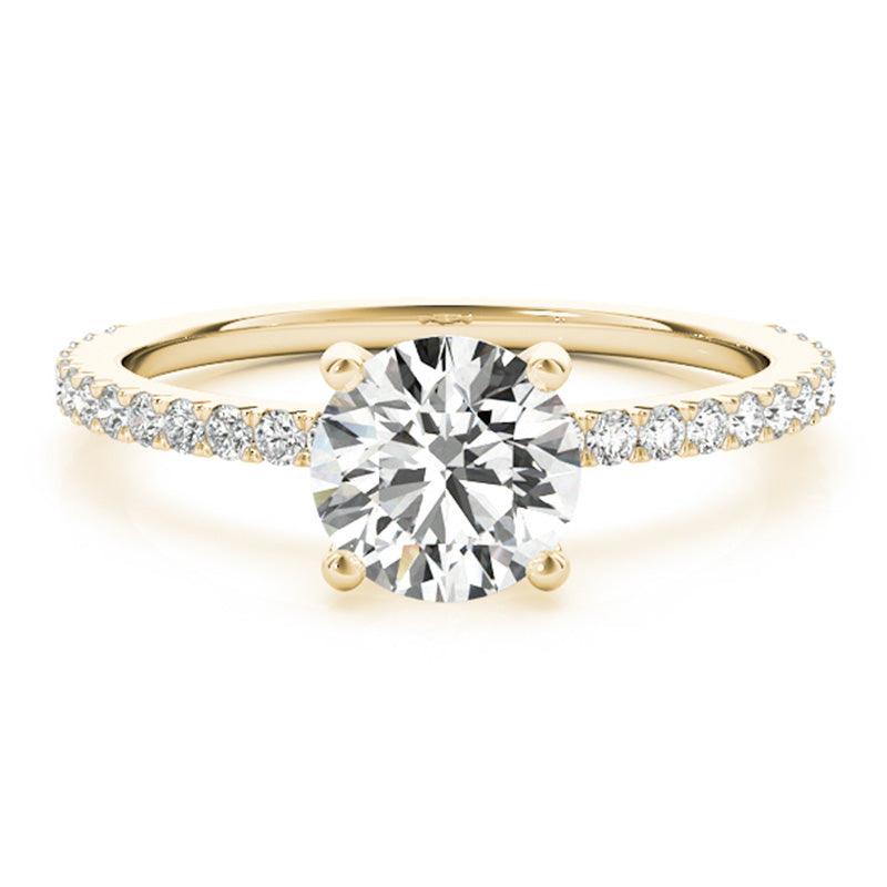 April engagement ring in yellow gold, front view showing the round brilliant centre above a diamond set band