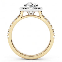 Side view of Ariana - A yellow gold engagement ring with a round-cut centre stone and a halo of small pavé-set diamonds.