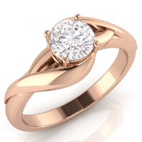 Arlana rose gold Celtic knot engagement ring, angled view of the round brilliant centre diamond in a four claw setting above the interlaced band.