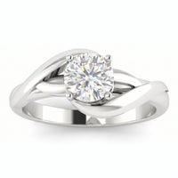 Arlana Celtic knot engagement ring in white gold or platinum, front view showing the two strands of the band crossing beneath the round brilliant diamond.