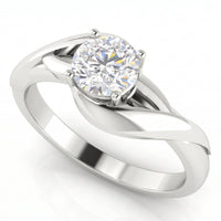 Arlana Celtic knot diamond solitaire ring in white gold or platinum, side angle showing the polished interlace sweeping up into the centre setting.