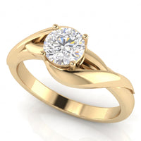 Arlana yellow gold Celtic knot diamond solitaire ring, side angle showing the polished interlace sweeping up into the centre setting.
