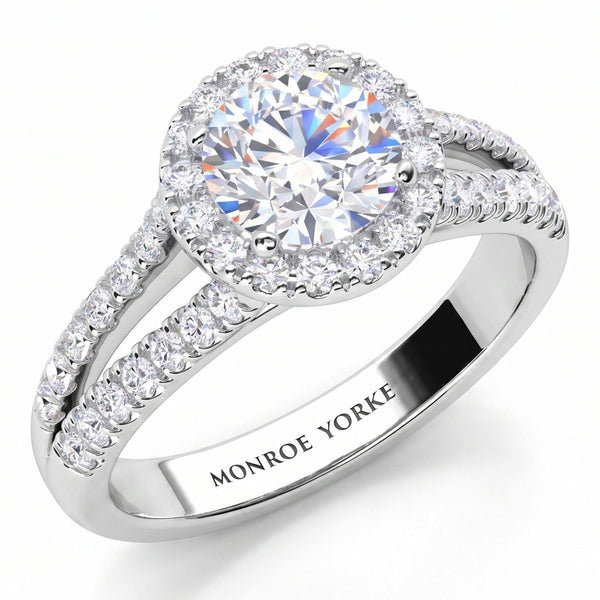 Ceduna - Round centre diamond engagement ring with a halo  and a diamond set split band. white gold or platinum. 