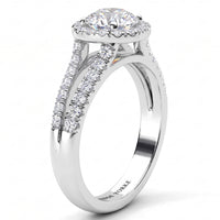 Ceduna -  diamond engagement ring with a round-cut centre stone, halo setting, and pavé diamond set split band on a clean white background. White Gold or Platinum