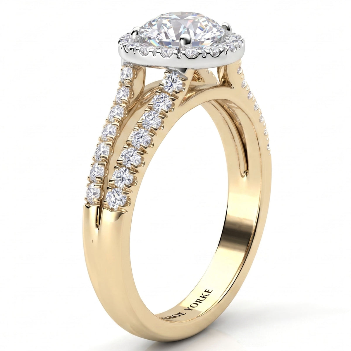 A yellow gold diamond ring with a round-cut centre stone, a halo, and pavé-set diamond split bands, shown on a white background. 