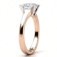 Chester rose gold solitaire engagement ring, angled view of the princess cut centre diamond in a V claw setting on a plain tapered band.