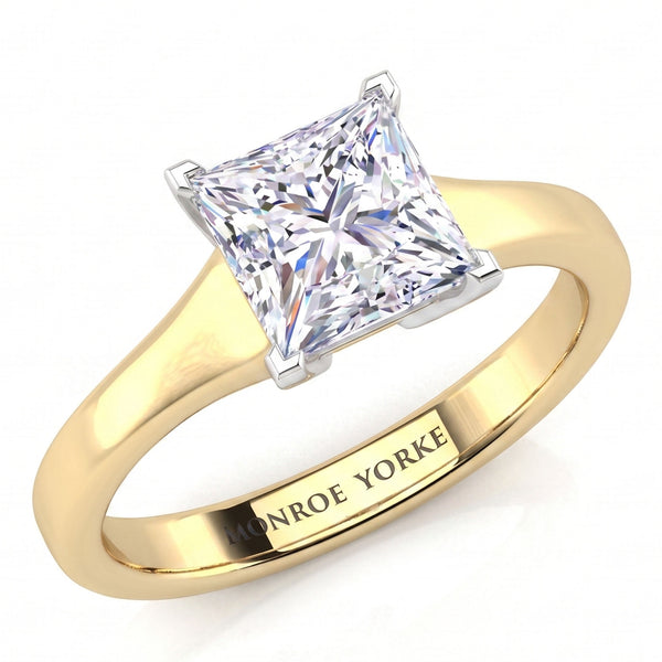 Chester - A princess-cut diamond engagement ring with a yellow gold band engraved with the name 'MONROE YORKE', shown on a clean white background.