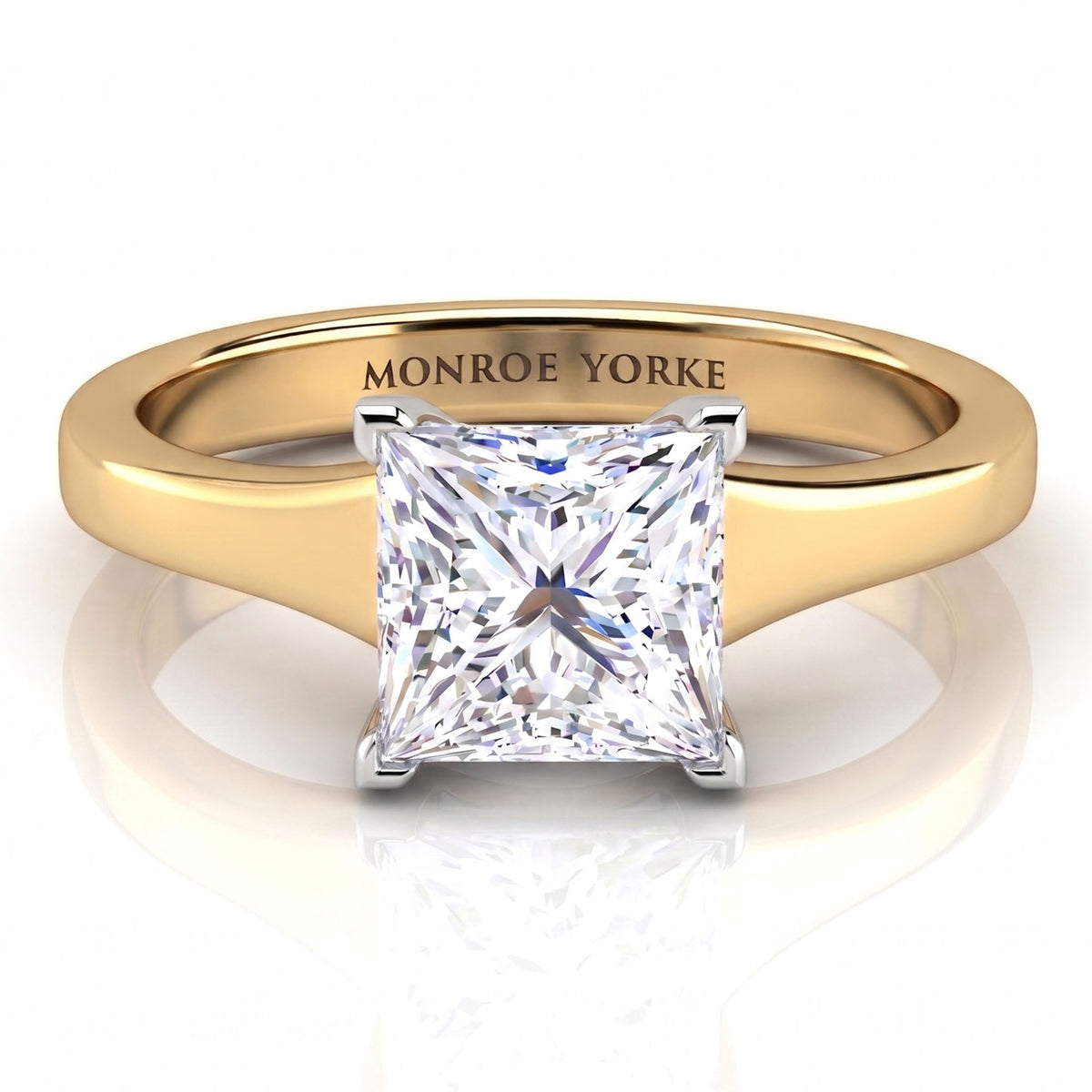 Chester - A princess-cut diamond solitaire engagement ring with a yellow gold band engraved with 'MONROE YORKE', 