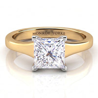 Chester - A princess-cut diamond solitaire engagement ring with a yellow gold band engraved with 'MONROE YORKE', 