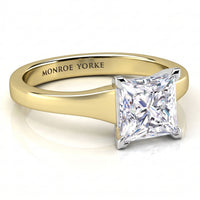 Chester -  princess-cut diamond engagement ring with a yellow gold band, featuring the brand name 'MONROE YORKE' engraved inside the band, set against a clean white background.