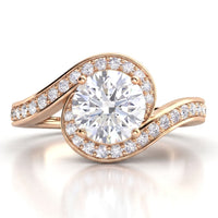 Clementine rose gold engagement ring, round centre diamond wrapped by a micro claw set diamond band.