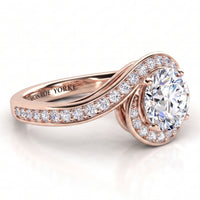 Clementine rose gold engagement ring, side view of the round centre diamond and the wrapped diamond set band.