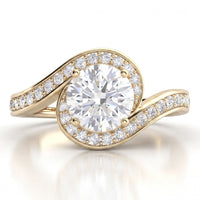 Clementine yellow gold engagement ring, round centre diamond wrapped by a micro claw set diamond band.