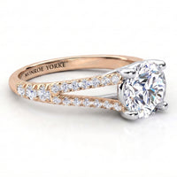 Cora rose gold split band engagement ring, micro claw set diamonds running up both sides of the split.
