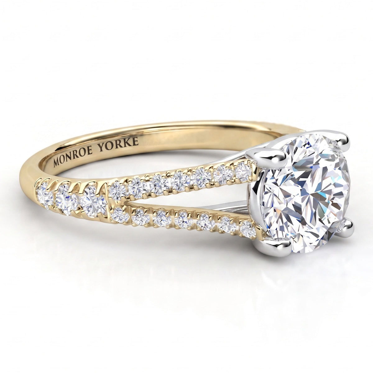 Cora yellow gold split band engagement ring, round centre diamond with micro claw set diamonds running up the split.