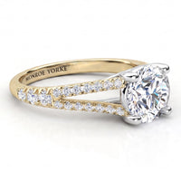 Cora yellow gold split band engagement ring, round centre diamond with micro claw set diamonds running up the split.