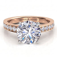 Danae engagement ring in rose gold, pave diamonds set either side of the centre stone, MONROE YORKE engraved inside the band.