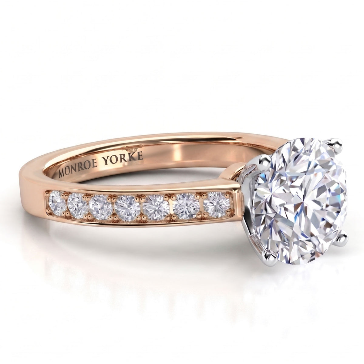 Danae engagement ring in rose gold. Close view showing the white metal centre setting against the rose gold band.