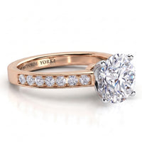 Danae engagement ring in rose gold. Close view showing the white metal centre setting against the rose gold band.
