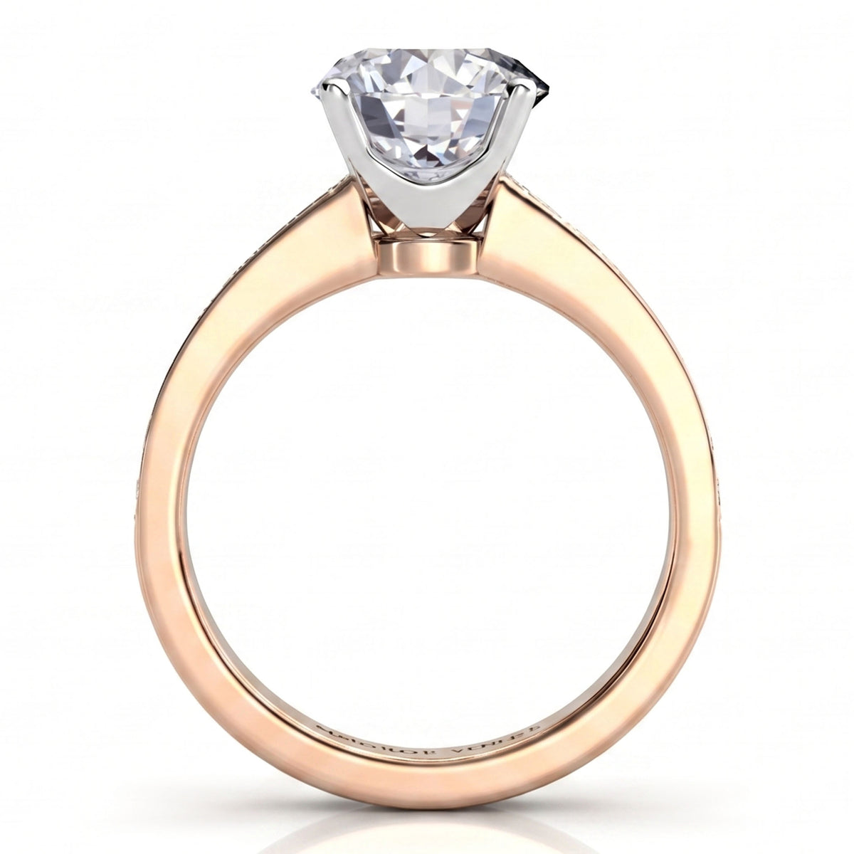 Danae engagement ring in rose gold, showing the round brilliant centre diamond in its white metal setting.