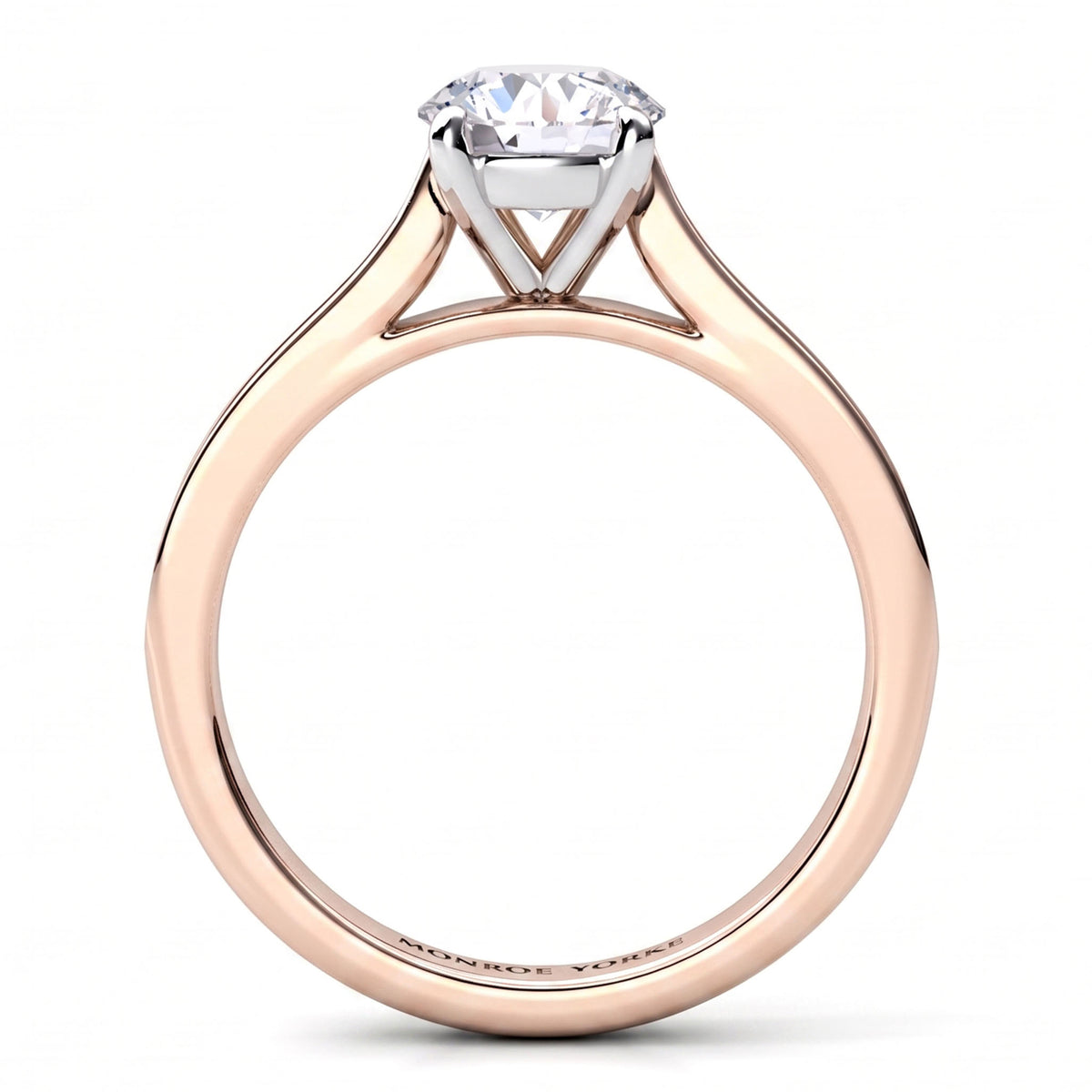 Denver rose gold engagement ring, round brilliant centre diamond in a four claw head, shown from above.