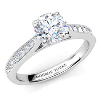 Denver engagement ring in white gold or platinum, round brilliant centre diamond in a four claw head.