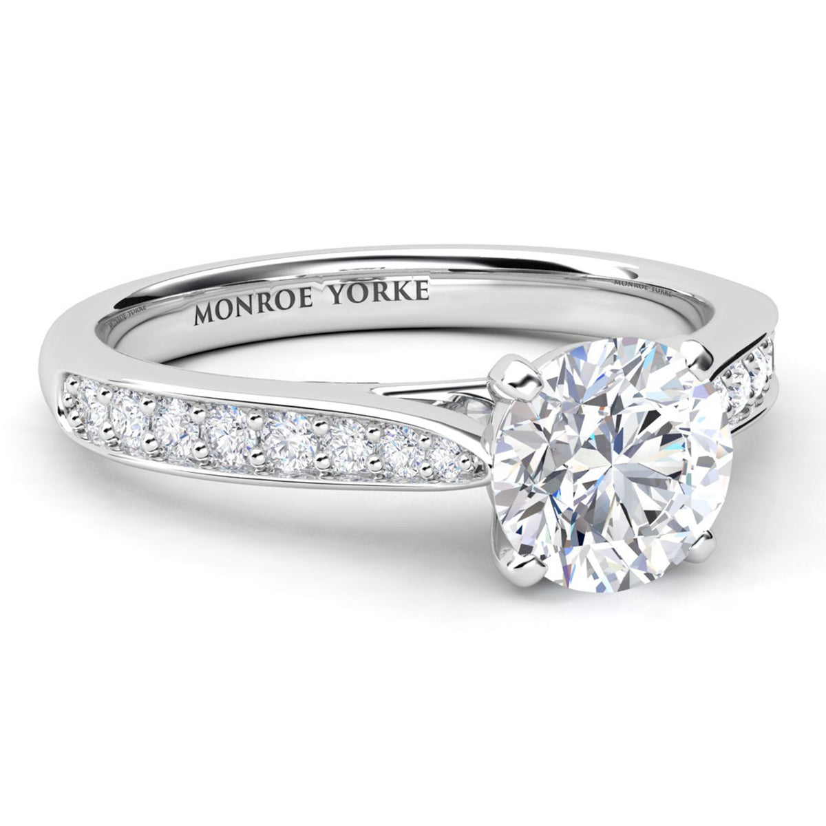 Denver engagement ring in white gold or platinum, diamond set band tapering into the centre setting.