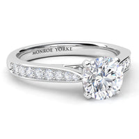 Denver engagement ring in white gold or platinum, diamond set band tapering into the centre setting.