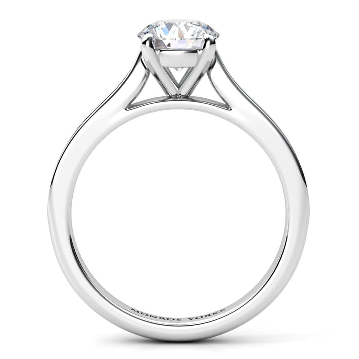 Denver engagement ring in white gold or platinum, side view showing the four claw centre setting.