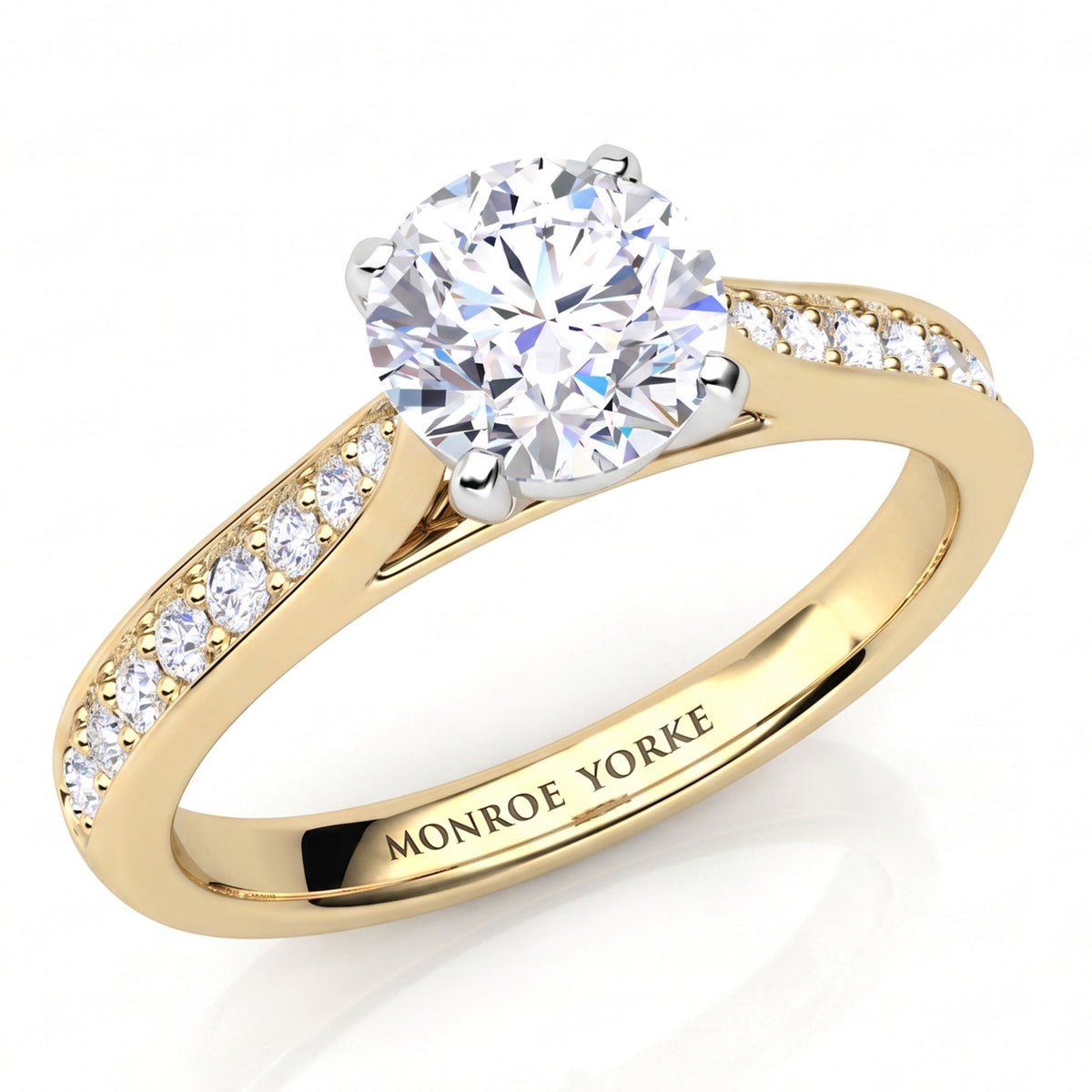 Denver yellow gold engagement ring, round brilliant centre diamond and a tapered diamond set band, Monroe Yorke engraved inside the band.
