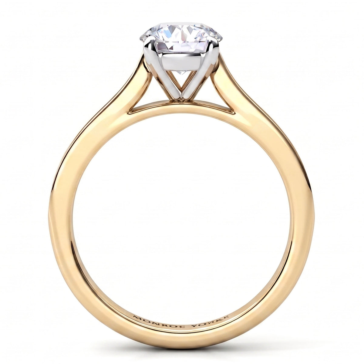Denver yellow gold engagement ring, side view showing the four claw centre head and the diamonds running along the shoulders.