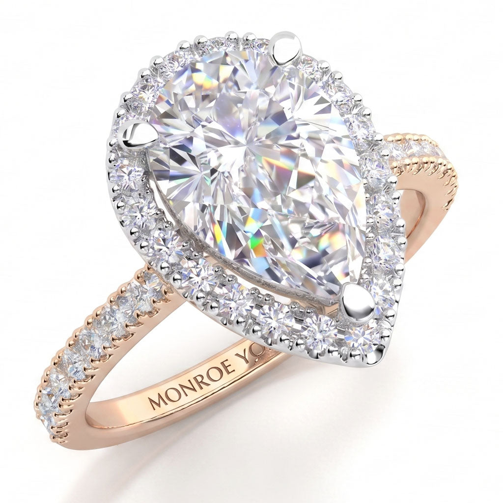 Dune pear cut diamond halo engagement ring in 18ct rose gold, top view
