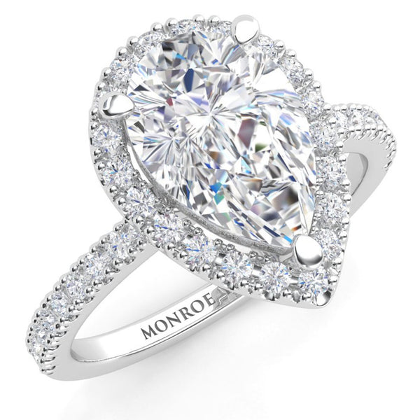 Dune Pear Cut Diamond Halo Engagement Ring, Diamonds on the band. 18ct White gold 