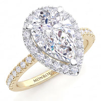 Dune pear cut diamond halo engagement ring in 18ct yellow gold, top view