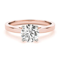 Elora four claw solitaire engagement ring in rose gold, front view with the round brilliant centre raised on four claws